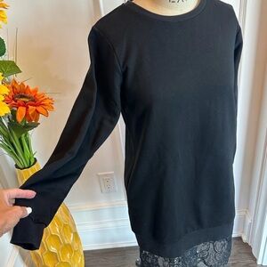 MINKPINK Women’s black sweatshirt dress with lace trim and pockets. Size M